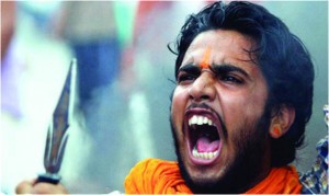 large-A Hindu protestor shouts slogans during communal riots with Muslims in Kishtwar