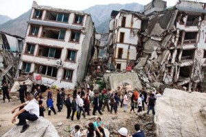 April 25, 2015 - Kathmandu, Nepal - Buildings are damaged after earthquake in Kathmandu, Nepal, April 25, 2015. More than 720 people, including 256 in the capital of Kathmandu, have been killed in a 7.8 magnitude earthquake. A powerful earthquake struck Nepal Saturday, killing at least 1,180 people across a swath of four countries as the violently shaking earth collapsed houses, leveled centuries-old temples and triggered avalanches on Mt. Everest. It was the worst tremor to hit the poor South Asian nation in over 80 years. At least 1,130 people were confirmed dead across Nepal, according to the police. Another 34 were killed in India, 12 in Tibet and two in Bangladesh. Two Chinese citizens died in the Nepal-China border. The death toll is almost certain to rise, said deputy Inspector General of Police Komal Singh Bam. (Credit Image: © Stringer/Xinhua/ZUMA Wire)
